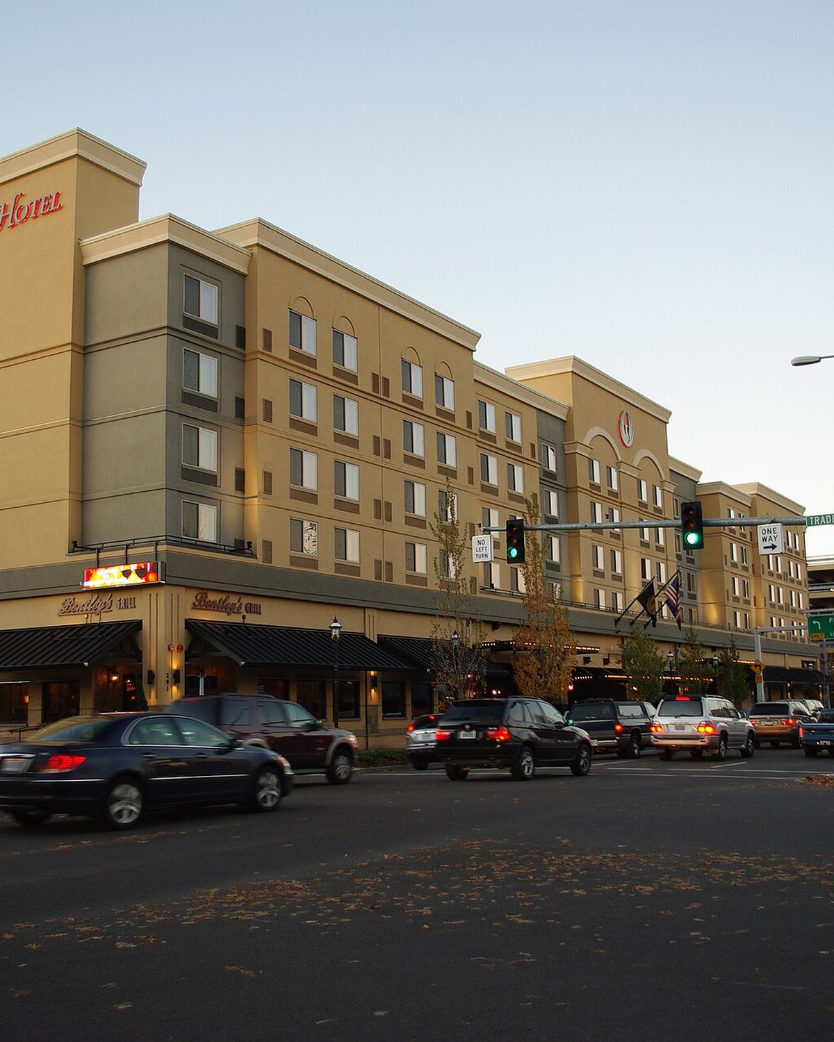 Downtown Salem, Oregon at dusk with historic storefronts and street lights
